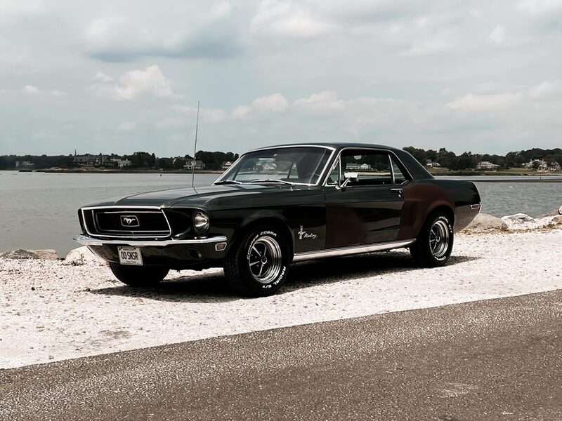 1968 Ford Mustang Coupe — original-survivor example, parked by the water